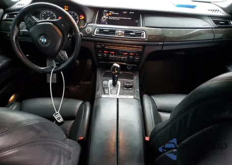 2015 BMW 750 I z USA, uszkodzony, nr VIN WBAYA8C52FD825641